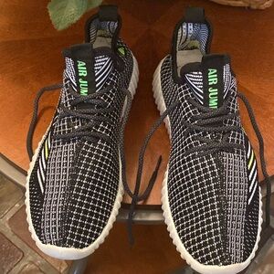 Black and White Air Jump Sneakers with Green Accents